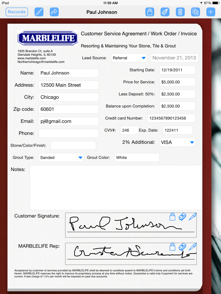 Service technician uses his ipad to collect signatures